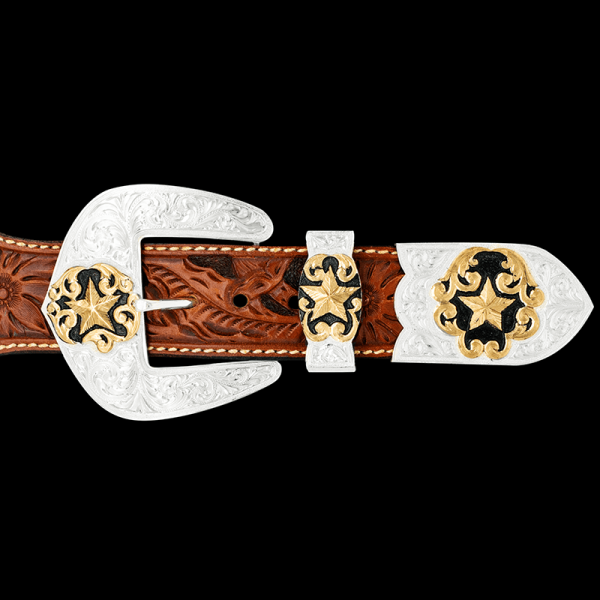 Our Pecos Custom Three Piece Buckle Set is an absolute beauty!  Built with sterling silver, this buckle is detailed with golden stars on buckle, loop and tip. Pair it with a discount belt and keychain!